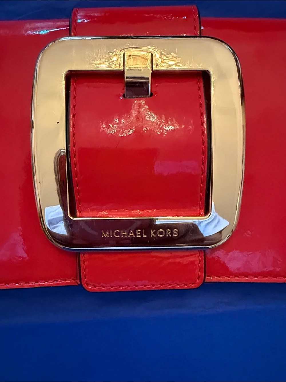 Michael Kors Glossy Orange Patent Leather Clutch with Gold Buckle